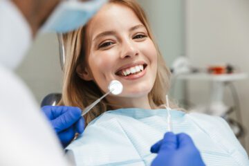 Image of a woman sitting in dental chair