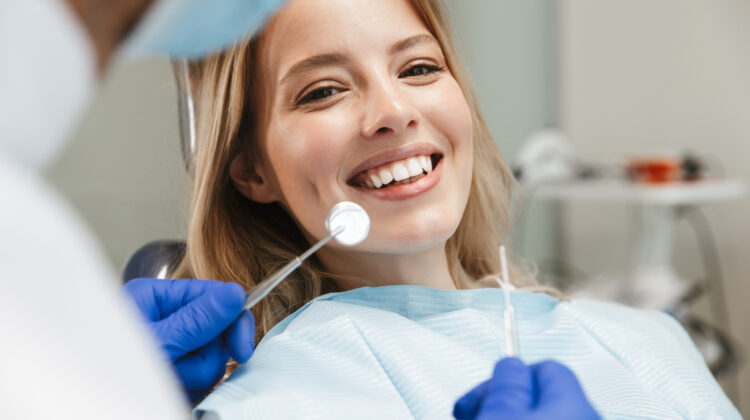 Image of a woman sitting in dental chair