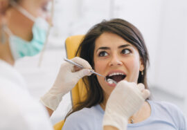 Woman at the dentist office getting checked