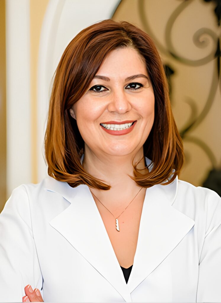 Dr Ravon Smiling Portrait Image in a Coat