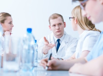 A Group of Doctors Talking Over an Issue